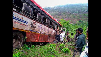 At around 5:45 am, bus driver lost control of the wheels due to dense fog and it broke the road railing and fell into the gorge. (PTI) At around 5:45 am, bus driver lost control of the wheels due to dense fog and it broke the road railing and fell into the gorge. (PTI)