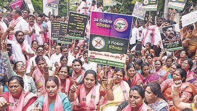 BRS MLC K Kavitha with party workers raises slogans during a protest against Telangana Congress President Revanth Reddy over his remarks on free electricity to farmers, in Hyderabad on Wednesday. (PTI) BRS MLC K Kavitha with party workers raises slogans during a protest against Telangana Congress President Revanth Reddy over his remarks on free electricity to farmers, in Hyderabad on Wednesday. (PTI)
