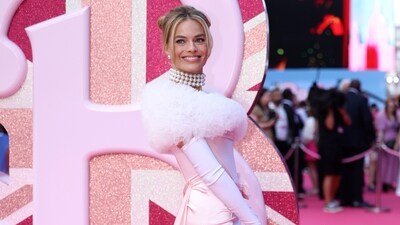 Margot Robbie poses for photographers upon arrival at the premiere of the film 'Barbie' on Wednesday, July 12, 2023, in London. (Vianney Le Caer/Invision/AP) (Vianney Le Caer/Invision/AP)