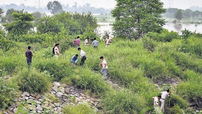 Police said two black bags with the body parts were found 50-60m away from each other, prompting officers to use a drone to scan a 1km radius to look for more evidence. (Sanchit Khanna/HT Photo) Police said two black bags with the body parts were found 50-60m away from each other, prompting officers to use a drone to scan a 1km radius to look for more evidence. (Sanchit Khanna/HT Photo)