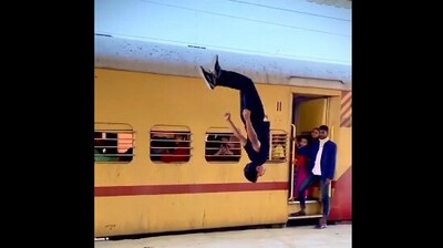 The image shows a man cartwheeling at a railway platform. (Twitter/@RPF_INDIA) The image shows a man cartwheeling at a railway platform. (Twitter/@RPF_INDIA)