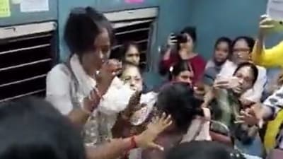 Women in Kolkata local train get into fight, beat each other with slippers. (Twitter)