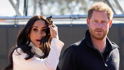 FILE - Prince Harry and Meghan Markle, Duke and Duchess of Sussex visit the track and field event at the Invictus Games in The Hague, Netherlands, Sunday, April 17, 2022.   The production company founded by Prince Harry and his wife, Meghan, are splitting ways with Spotify, Friday, June 16, 2023, less than a year after the debut of their podcast “Archetypes."(AP Photo/Peter Dejong, File) (AP)