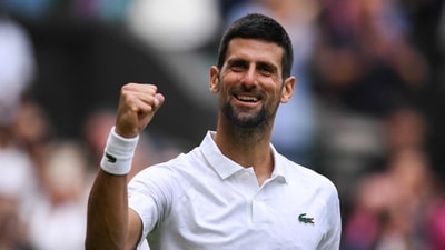 Serbia's Novak Djokovic celebrates winning against Russia's Andrey Rublev (AFP)