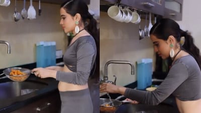 Uorfi Javed washing Kurkure in a video. (Instagram/@Uorfi Javed) Uorfi Javed washing Kurkure in a video. (Instagram/@Uorfi Javed)