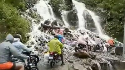 Pilgrims risk their life travelling through Gangotri highway (ANI) Pilgrims risk their life travelling through Gangotri highway (ANI)
