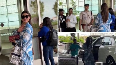 Mouni Roy was seen interacting with the security staff at the entrance of Mumbai airport. Mouni Roy was seen interacting with the security staff at the entrance of Mumbai airport.