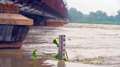 The swollen Yamuna river flows in full spate under the Old Yamuna Bridge (Loha Pul), in New Delhi, India, on Tuesday. (Photo by Sanjeev Verma/ Hindustan Times) The swollen Yamuna river flows in full spate under the Old Yamuna Bridge (Loha Pul), in New Delhi, India, on Tuesday. (Photo by Sanjeev Verma/ Hindustan Times)