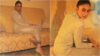 Rakul Preet Singh is an absolute beauty. She has the ability to rock any style, be it traditional or casual, and her latest photoshoot is a testament to that. She displayed her love for blingy outfits by adorning a dazzling shimmery pantsuit. Her fans are absolutely mesmerised by her look, and it's impossible for us to take our eyes off her. (Instagram/@rakulpreet) Rakul Preet Singh is an absolute beauty. She has the ability to rock any style, be it traditional or casual, and her latest photoshoot is a testament to that. She displayed her love for blingy outfits by adorning a dazzling shimmery pantsuit. Her fans are absolutely mesmerised by her look, and it's impossible for us to take our eyes off her. (Instagram/@rakulpreet)