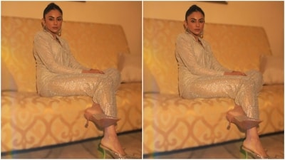 Her stunning outfit is from the shelves of the brand ITRH. It consists of a golden shimmery blazer and matching fitted straight pants. (Instagram/@rakulpreet) Her stunning outfit is from the shelves of the brand ITRH. It consists of a golden shimmery blazer and matching fitted straight pants. (Instagram/@rakulpreet)