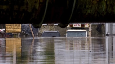 Vehicles are submerged in the Yamuna river as its water level rises after being released from Hathni Kund barrage due to heavy rainfall, at Teesra Pusta, Usman Pur area, in New Delhi on Wednesday. In view of the situation, the Delhi government has set up 16 control rooms to monitor the flood-prone areas and the water level of the Yamuna. (ANI) Vehicles are submerged in the Yamuna river as its water level rises after being released from Hathni Kund barrage due to heavy rainfall, at Teesra Pusta, Usman Pur area, in New Delhi on Wednesday. In view of the situation, the Delhi government has set up 16 control rooms to monitor the flood-prone areas and the water level of the Yamuna. (ANI)