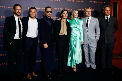 Cast members Trond Fausa Aurvag, Matt Damon, Robert Downey Jr., Cillian Murphy, Emily Blunt, Jason Clarke, and director Christopher Nolan pose during a photocall before the premiere of the film Oppenheimer at the Grand Rex in Paris, France, July 11, 2023. (REUTERS)
