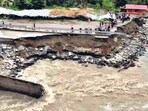A view of a damaged road in Manali, caused by flooding in view of incessant rains in Himachal Pradesh, on Wednesday. (ANI)