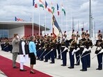 France's Prime Minister Elisabeth Borne (3L) and Prime Minister Narendra Modi (2L) stand in front of French Republican Guards at the Orly airport in Orly, Paris' suburb. France's Prime Minister Elisabeth Borne (3L) and Prime Minister Narendra Modi (2L) stand in front of French Republican Guards at the Orly airport in Orly, Paris' suburb.