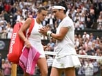 Tunisia’s Ons Jabeur applauds Belarus’ Aryna Sabalenka as she leaves the court after their semi-final match