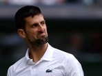 Serbia's Novak Djokovic reacts during his quarter final match against Russia's Andrey Rublev 