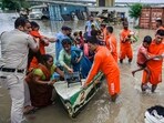 NDRF (National Disaster Response Force) personnel rescue a baby along with other people from low-lying areas around the Yamuna river. near Mayur Vihar Side in New Delhi, India, on Wednesday. (Photo by Raj K Raj/ Hindustan Times) NDRF (National Disaster Response Force) personnel rescue a baby along with other people from low-lying areas around the Yamuna river. near Mayur Vihar Side in New Delhi, India, on Wednesday. (Photo by Raj K Raj/ Hindustan Times)
