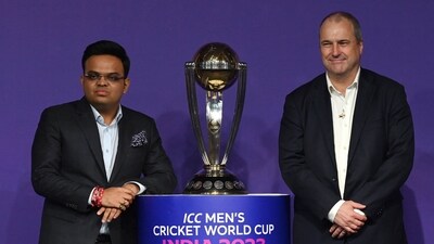 BCCI Secretary Jay Shah (L) and ICC Chief Executive Geoff Allardice pose with the trophy of the upcoming Men's Cricket World Cup (AFP) BCCI Secretary Jay Shah (L) and ICC Chief Executive Geoff Allardice pose with the trophy of the upcoming Men's Cricket World Cup (AFP)
