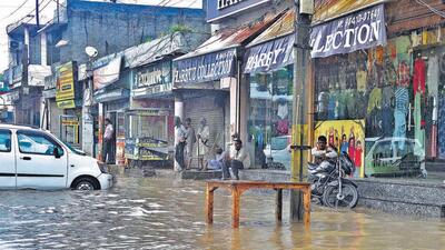 Ludhiana: Traders count losses as water enters shops . (HT FILE) Ludhiana: Traders count losses as water enters shops . (HT FILE)