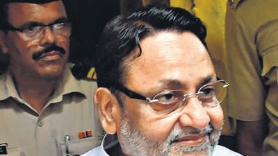 Mumbai: NCP leader and Maharashtra Minister Nawab Malik being taken to court from the Arthur Road Jail, in Mumbai, Friday, April 22, 2022. (PTI Photo)(PTI04_22_2022_000088B) (PTI) Mumbai: NCP leader and Maharashtra Minister Nawab Malik being taken to court from the Arthur Road Jail, in Mumbai, Friday, April 22, 2022. (PTI Photo)(PTI04_22_2022_000088B) (PTI)