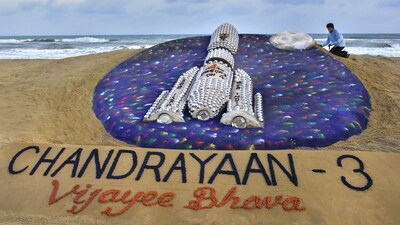 Artist Sudarsan Pattnaik creates a sand art to wish good luck to ISRO scientists ahead of ISRO's Chandrayaan-3 mission, in Puri, Thursday, (PTI) Artist Sudarsan Pattnaik creates a sand art to wish good luck to ISRO scientists ahead of ISRO's Chandrayaan-3 mission, in Puri, Thursday, (PTI)