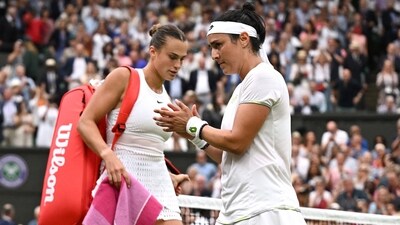 Tunisia’s Ons Jabeur applauds Belarus’ Aryna Sabalenka as she leaves the court after their semi-final match (REUTERS)