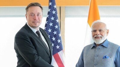 Prime Minister Narendra Modi shakes hand with Tesla chief executive Elon Musk during their meeting in New York City, New York, U.S., June 20, 2023. India's Press Information Bureau/Handout via REUTERS THIS IMAGE HAS BEEN SUPPLIED BY A THIRD PARTY. NO RESALES. NO ARCHIVES./File Photo