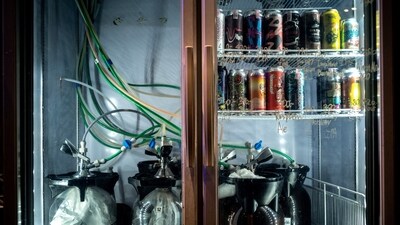 Various cans of beers and craft beers are displayed at Taopiphop Bar Project, in Bangkok, Thailand, May 23, 2023. (REUTERS)
