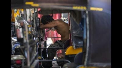 The autorickshaw drivers’ union in Bengaluru alleged the Congress-led state government neglected them in the recent budget (AP) The autorickshaw drivers’ union in Bengaluru alleged the Congress-led state government neglected them in the recent budget (AP)