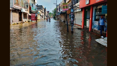 The residential colonies along the Buddha Nullah remains flooded in Ludhiana on Thursday; and (right) a big road cave-in on the ATI Road. (Gurpreet Singh/HT) The residential colonies along the Buddha Nullah remains flooded in Ludhiana on Thursday; and (right) a big road cave-in on the ATI Road. (Gurpreet Singh/HT)