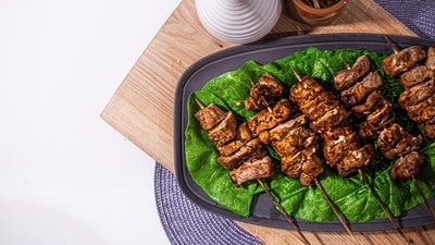 Kebab Day is indeed a delightful occasion to celebrate the rich and flavorful world of kababs in India. From succulent meat preparations to delectable vegetarian options, Indian cuisine offers a diverse range of kababs that are sure to satisfy your taste buds. Here are some must-try kababs from different regions of India that will leave you craving for more. (Unsplash) Kebab Day is indeed a delightful occasion to celebrate the rich and flavorful world of kababs in India. From succulent meat preparations to delectable vegetarian options, Indian cuisine offers a diverse range of kababs that are sure to satisfy your taste buds. Here are some must-try kababs from different regions of India that will leave you craving for more. (Unsplash)