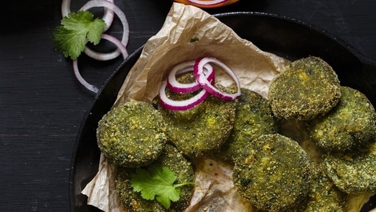 Hara Bhara Kebab (Mumbai, Maharashtra): If you prefer vegetarian kababs, Hara Bhara Kebab is a delightful choice. Made with a mixture of spinach, peas, potatoes, and aromatic spices, these green-colored kababs are pan-fried or baked. They are often served with mint chutney or as a part of the popular street food snack, the "Kebab Platter."(Pinterest )