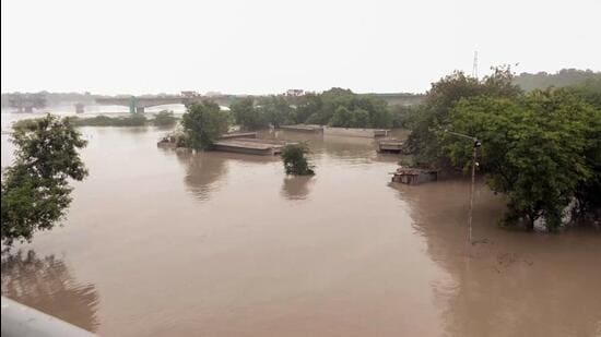 A view of the flooded area as Yamuna river reaches dangerous levels due to rains and release of water from Hathnikund Barrage, in New Delhi on Thursday. (ANI)