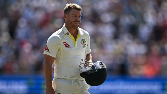 Australia's David Warner walks back after being dismissed by Stuart Broad (AFP)