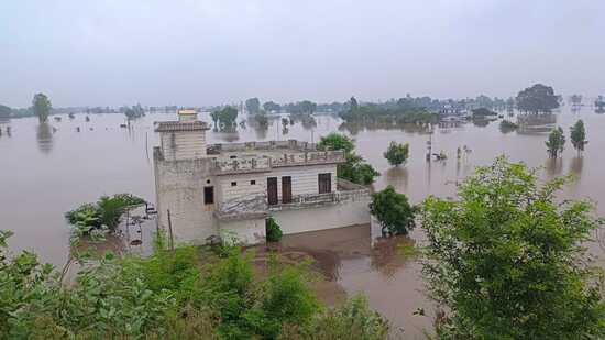 The river is flowing 6 feet above danger mark; At least 20 villages affected, with nearly 25,000 acres of agricultural land submerged
