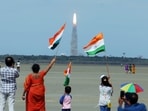 Chandrayaan 3 Launch: People wave the national flag as they celebrate the launch of Chandrayaan-3 mission from the Satish Dhawan Space Centre, in Sriharikota on Friday. Chandrayaan 3 Launch: People wave the national flag as they celebrate the launch of Chandrayaan-3 mission from the Satish Dhawan Space Centre, in Sriharikota on Friday.
