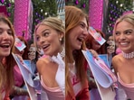 Snapshot of Margot Robbie and fan recreating film's dialogue. Snapshot of Margot Robbie and fan recreating film's dialogue.