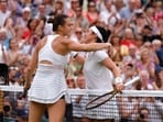 Belarus’ Aryna Sabalenka and Tunisia’s Ons Jabeur hug at the net after their semi final match 