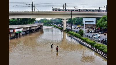 A road near ISBT after the swollen Yamuna river flooded low-lying areas across NCR. (Photo: PTI) A road near ISBT after the swollen Yamuna river flooded low-lying areas across NCR. (Photo: PTI)