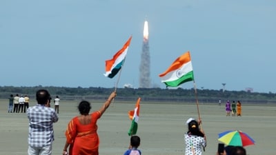 Chandrayaan 3 Launch: People wave the national flag as they celebrate the launch of Chandrayaan-3 mission from the Satish Dhawan Space Centre, in Sriharikota on Friday. (Anathakrishnan L) Chandrayaan 3 Launch: People wave the national flag as they celebrate the launch of Chandrayaan-3 mission from the Satish Dhawan Space Centre, in Sriharikota on Friday. (Anathakrishnan L)