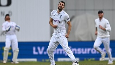 England's Mark Wood (C) celebrates (AFP) England's Mark Wood (C) celebrates (AFP)