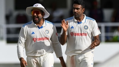 Rohit Sharma (L) and Ravichandran Ashwin (R), of India, celebrate the dismissal of Alick Athanaze, of West Indies, during day three of the First Test between West Indies and India (AFP) Rohit Sharma (L) and Ravichandran Ashwin (R), of India, celebrate the dismissal of Alick Athanaze, of West Indies, during day three of the First Test between West Indies and India (AFP)