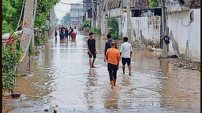 Multiple dying units are located at Kakka road, which was waterlogged because of the heavy rain in Ludhiana. (HT PHOTO)