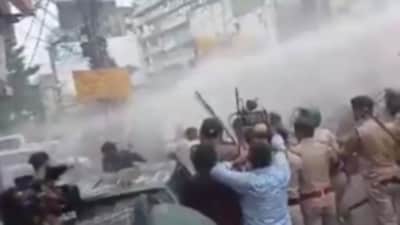 Police disperse protesting crowd using water canon in Patna, Bihar (Twitter Photo) Police disperse protesting crowd using water canon in Patna, Bihar (Twitter Photo)