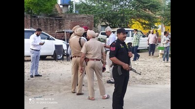 The encounter took place when the robbers hit their car with a vehicle of Manochahal police station in the outskirts of Kot Dharam Chand village. (HT Photo) The encounter took place when the robbers hit their car with a vehicle of Manochahal police station in the outskirts of Kot Dharam Chand village. (HT Photo)