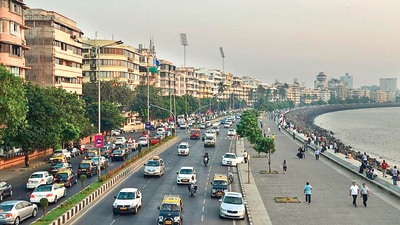 This photo taken on November 8, 2017 shows the Marine Drive seafront in Mumbai. The seafront is lined with brightly coloured buildings boasting curved corners, stylish balconies and exotic motifs but this isn't Miami's famous Art Deco district -- it's Mumbai. Bombay, as the Indian city was formerly called, is known more for its Victorian Gothic edifices than the sleeker architectural designs that swept Europe and America during the 1920s and '30s. / AFP PHOTO / PUNIT PARANJPE / To go with: 'INDIA-ARCHITECTURE-HERITAGE-ARTDECO, FEATURE' by Peter HUTCHISON (AFP) This photo taken on November 8, 2017 shows the Marine Drive seafront in Mumbai. The seafront is lined with brightly coloured buildings boasting curved corners, stylish balconies and exotic motifs but this isn't Miami's famous Art Deco district -- it's Mumbai. Bombay, as the Indian city was formerly called, is known more for its Victorian Gothic edifices than the sleeker architectural designs that swept Europe and America during the 1920s and '30s. / AFP PHOTO / PUNIT PARANJPE / To go with: 'INDIA-ARCHITECTURE-HERITAGE-ARTDECO, FEATURE' by Peter HUTCHISON (AFP)