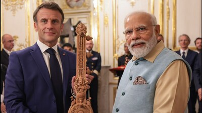PM Modi gifted Sandalwood Sitar for French President Emmanuel Macron (ANI) PM Modi gifted Sandalwood Sitar for French President Emmanuel Macron (ANI)