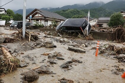 Mud and debris cover a street following a flood in Tanushimarumachi in the city of Kurume, Fukuoka prefecture, Japan (AFP ) Mud and debris cover a street following a flood in Tanushimarumachi in the city of Kurume, Fukuoka prefecture, Japan (AFP )