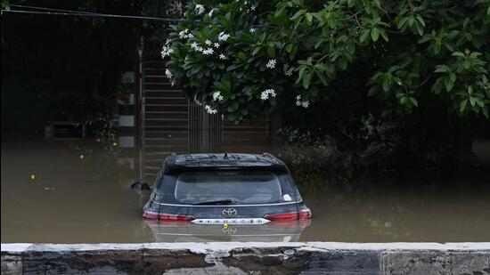 A view of the flooded Ring Road near Chandgiram Akhara on Friday. (Raj K Raj/HT PHOTO)
