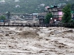 The overflowing river Beas following heavy rains in Kullu district in the northern state of Himachal Pradesh, India. Himachal tourism suffers another jolt after Covid-19 amid heavy rain and flood 